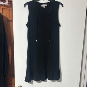 Michael Kors Black Dress - sleeveless with ruffled bottom.  Dressy or Casual.